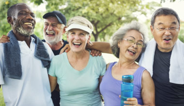 photo of a group of seniors laughing together