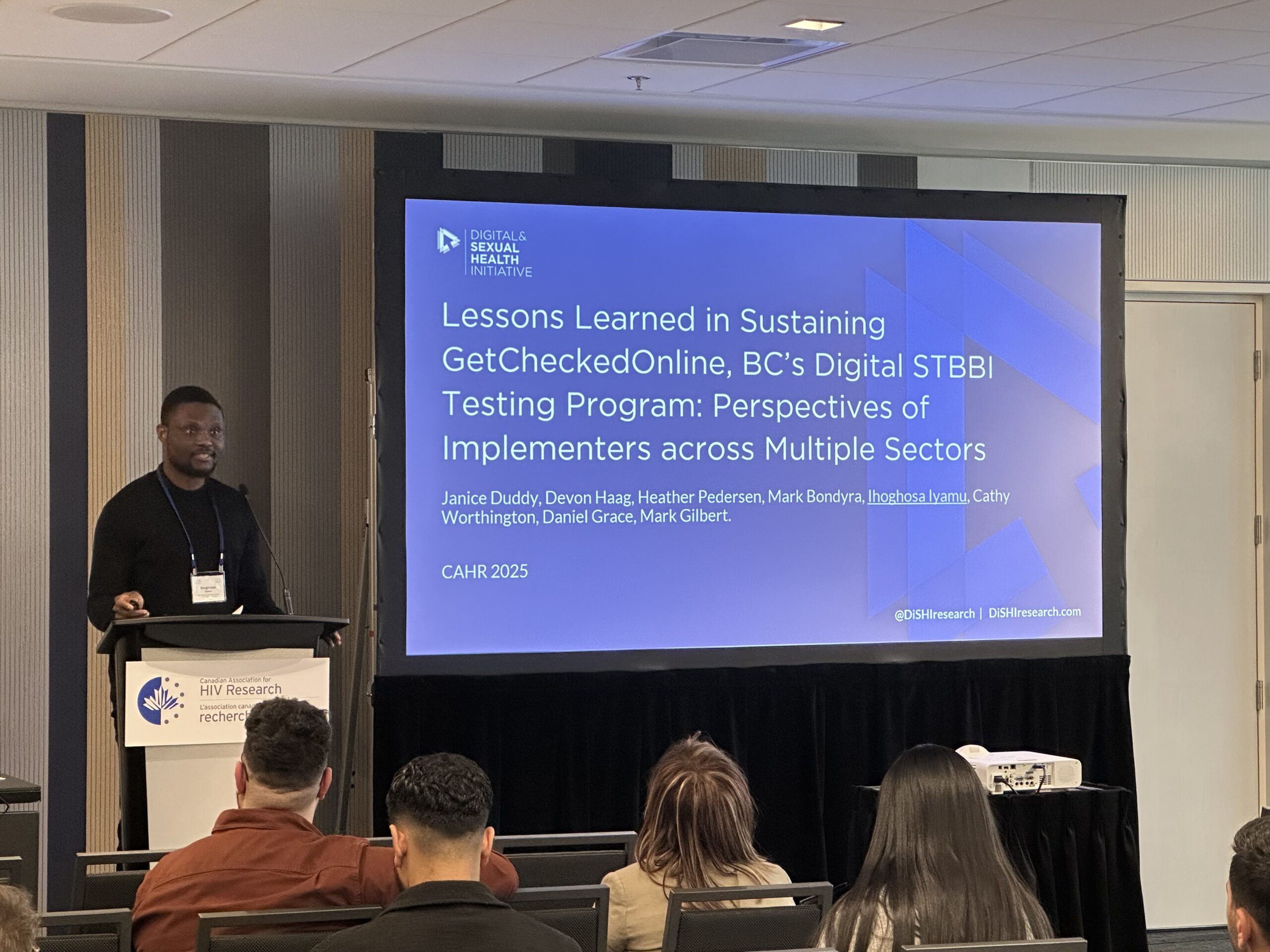 Dr. Iyamu presenting at a the conference CAHR 2025. 