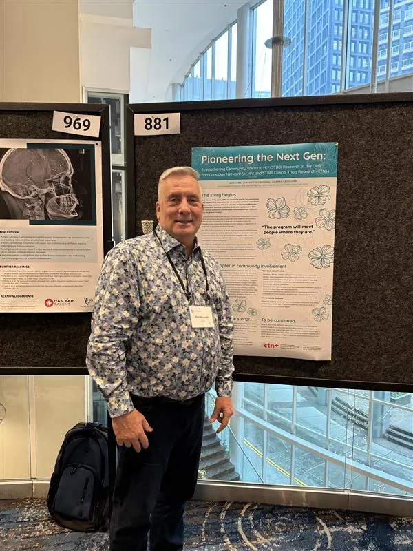 Darren Lauscher presenting a poster on community voices in research at the Patient Voices 2025 conference. 